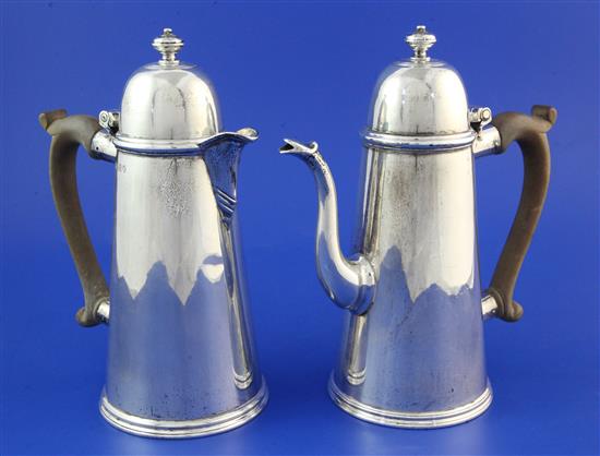 A George V 18th century style silver cafe au lait pair by William Comyns & Sons Ltd, gross 33 oz.